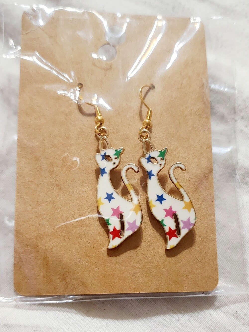 Source Unknown White Cat Earrings with Multicolor Stars